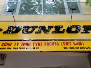 Biển quảng cáo cừa hàng DUNLOP